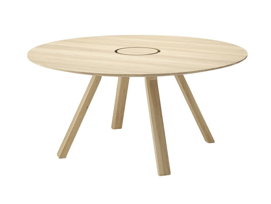 Table ronde Spectrum ST 160 en chêne et son anneau passe-câbles, Geckeler Michels — vue studio en plongée n°1 | Antifer