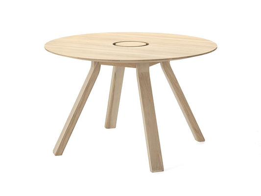 Table ronde Spectrum ST 120 en chêne clair et son anneau passe-câbles, Geckeler Michels — vue studio n°1 | Antifer