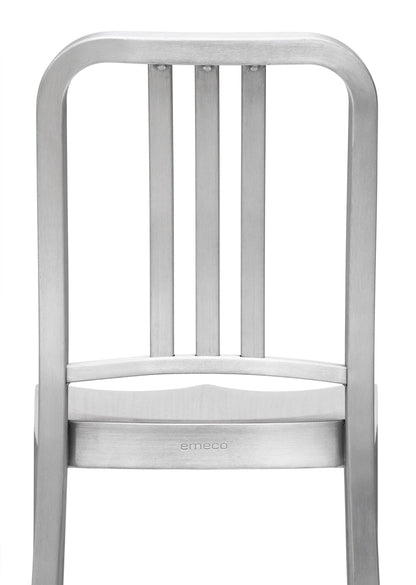 Emeco 1006 Navy Chair in a restaurant setting — stackable brushed aluminium | Antifer