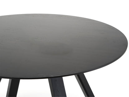 Table ronde Spectrum ST 120 — détail du chant du plateau noir et de la jonction des trois pieds | Antifer