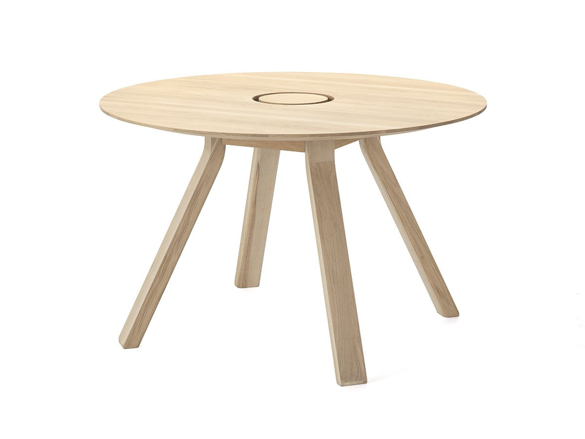 Table ronde Spectrum ST 120 en chêne clair et son anneau passe-câbles, Geckeler Michels — vue studio n°1 | Antifer