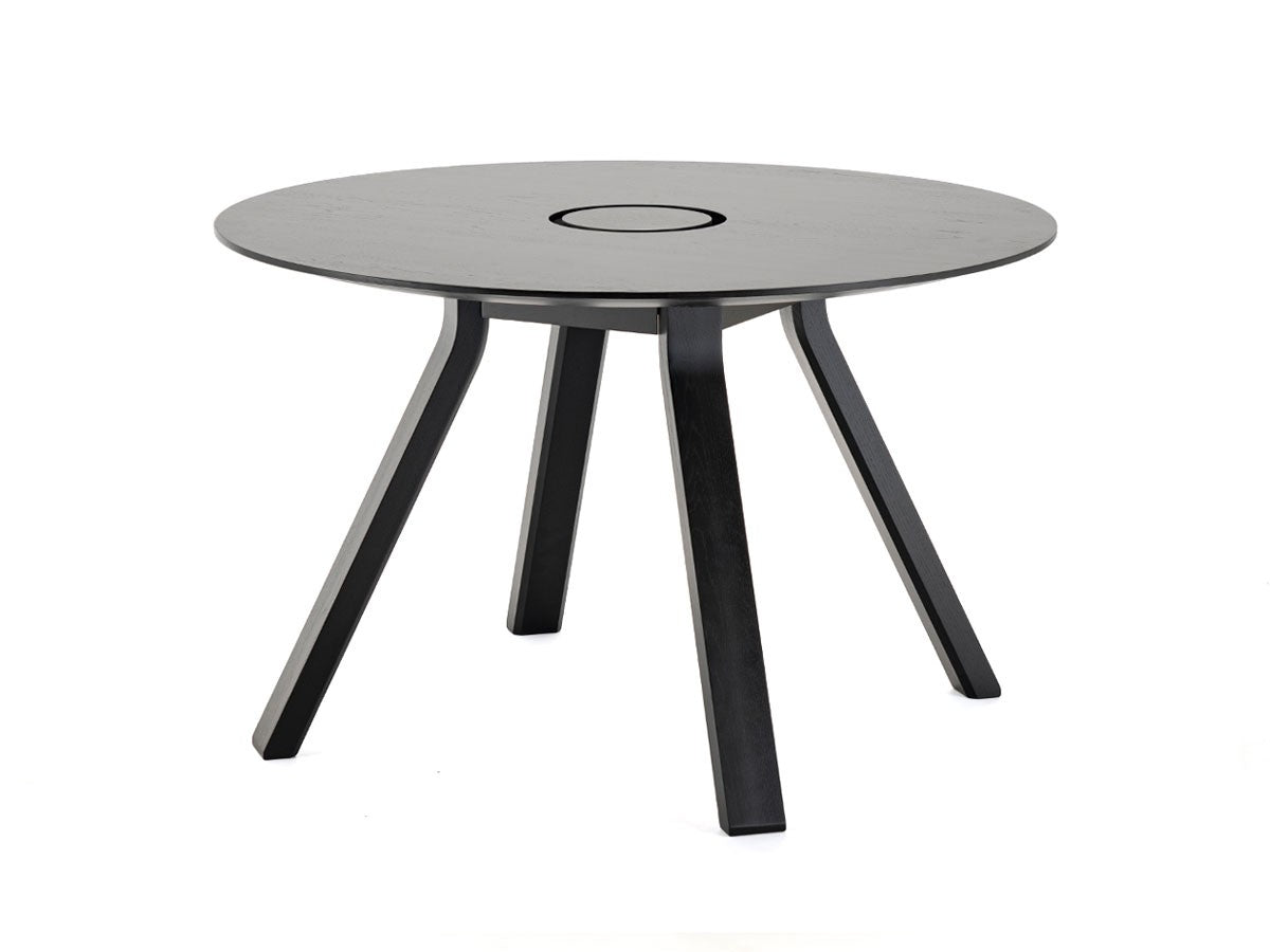 Table ronde Spectrum ST 120 en chêne teinté noir et son anneau passe-câbles, Geckeler Michels — vue studio n°2 | Antifer