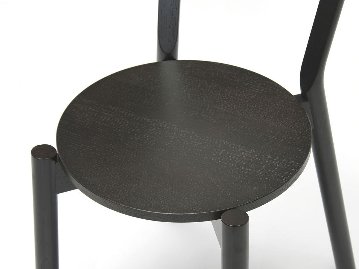 Chaise Castor — assise ronde noire vue en plongée, entretoises apparentes | Antifer