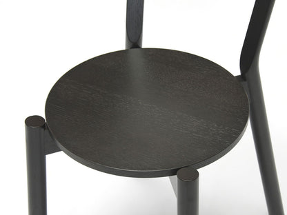 Chaise Castor — assise ronde noire vue en plongée, entretoises apparentes | Antifer