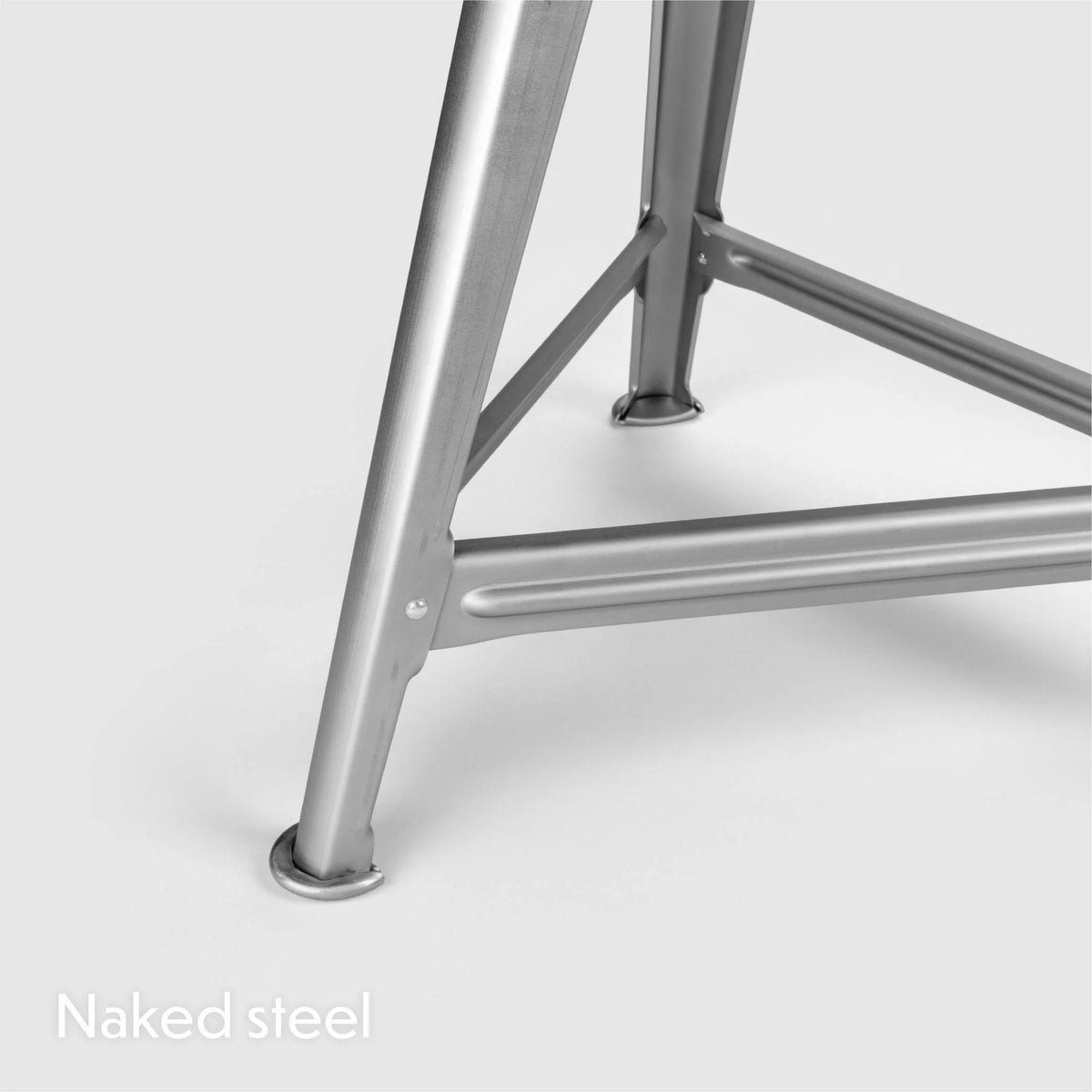 Rowac Schemel stool 50 cm, profile view — riveted steel and wood — industrial | Antifer