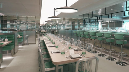 Emeco 1006 Navy chair at the Test Kitchen restaurant, Virgin Voyages — brushed aluminium in situ | Antifer