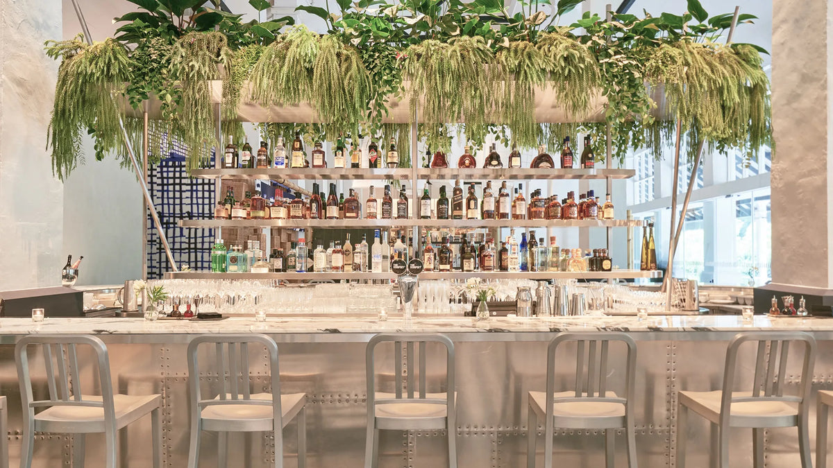 Emeco 1006 Navy at the Dempsey Cookhouse, Singapore — brushed aluminium | Antifer